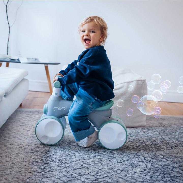 MoMi TOBIS jeździk z bańkami, światłem i dźwiękiem
